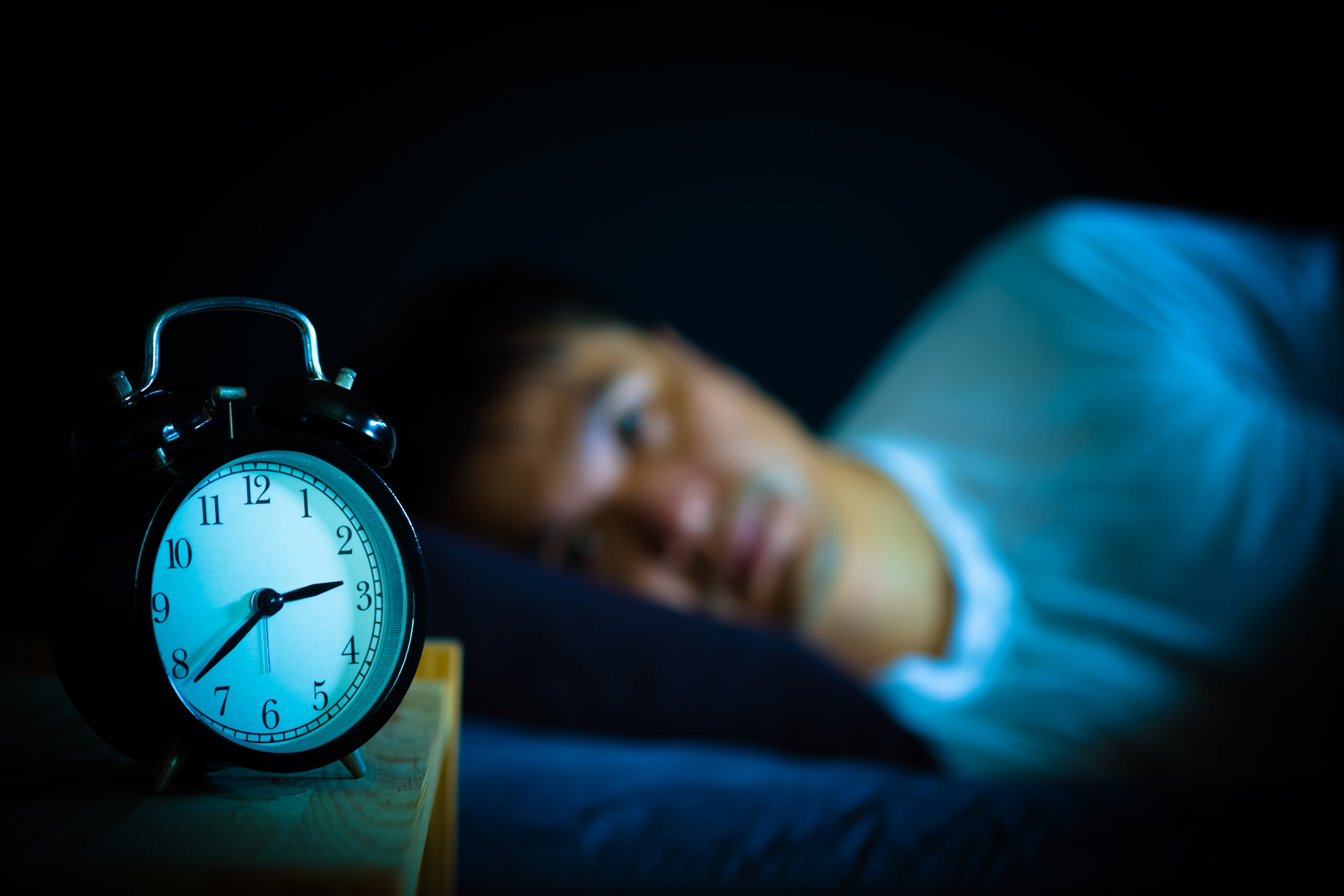 Woman suffering from sleep apnea