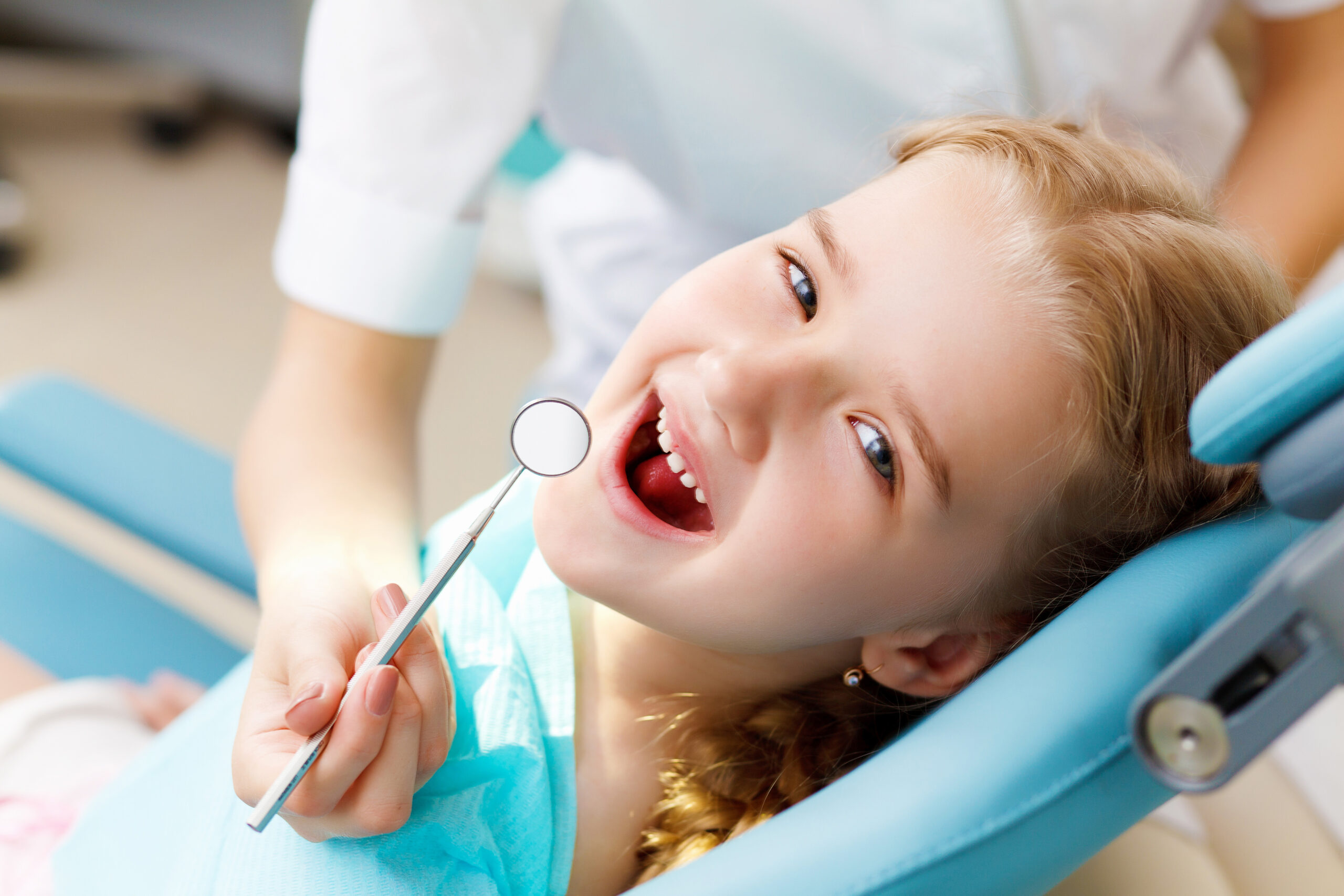 Young girl at a dental checkup 
